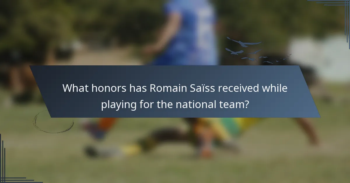 What honors has Romain Saïss received while playing for the national team?